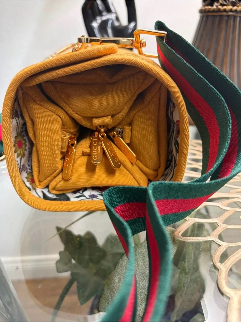 Gucci mustards yellow cylinder from beauty collection.